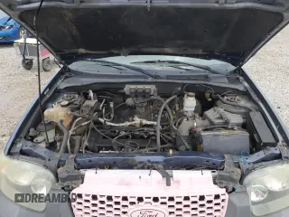 2005 Ford Escape XLS Value with VIN 1FMYU92Z95DA22100, listed as a Copart auction lot 57874705 with 192,057 mi miles and Salvage title. Bid and sale history available at DreamBid. Image 12.