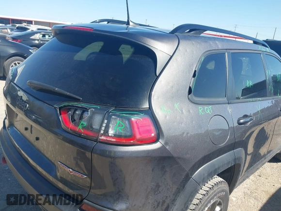 2022 Jeep Cherokee Trailhawk with VIN 1C4PJMBX4ND535037, listed as a IAAI auction lot 41779140 with 49,733 mi miles. Bid and sale history available at carsss.com. Image 17.