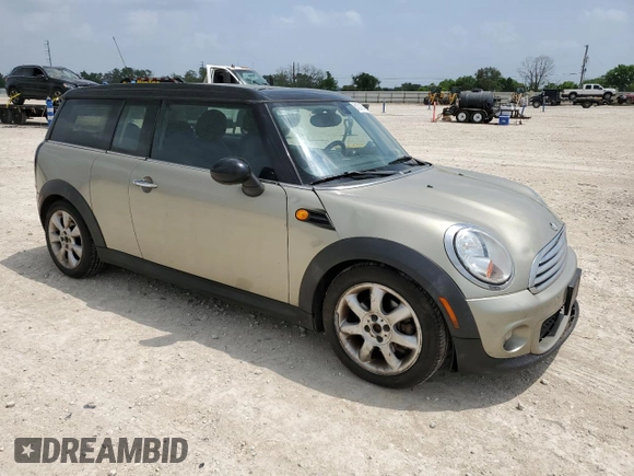 2011 MINI Clubman with VIN WMWZF3C51BTX81818, listed as a Copart auction lot 51218745 with 240,825 mi miles and Salvage Title. Bid and sale history available at DreamBid. Image 4.
