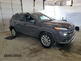 2018 Jeep Cherokee Overland with VIN 1C4PJMJXXJD594749, listed as a Copart auction lot 56049145 with 178,471 mi miles and Salvage title. Bid and sale history available at DreamBid. Image 4.