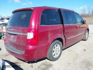 2012 Chrysler Town & Country Touring with VIN 2C4RC1BG2CR106801, listed as a IAAI auction lot 41872450 with 181,905 mi miles. Bid and sale history available at carsss.com. Image 4.