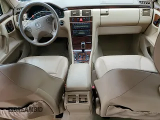 2001 Mercedes-Benz E-Class AWD with VIN WDBJF82J91X060969, listed as a Copart auction lot 71986544 with 113,694 mi miles and Salvage Title. Bid and sale history available at carsss.com. Image 8.