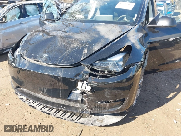 2024 Tesla Model Y with VIN 7SAYGDED5RF093018, listed as a IAAI auction lot 41747467 with 60,469 mi miles and . Bid and sale history available at DreamBid. Image 6.