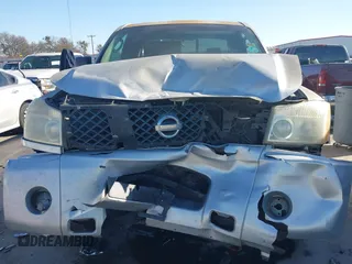 2004 Nissan Titan SE with VIN 1N6AA06A74N553025, listed as a IAAI auction lot 41466773 with 182,110 mi miles. Bid and sale history available at carsss.com. Image 6.