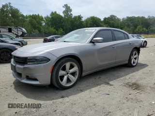2015 Dodge Charger SXT with VIN 2C3CDXHG4FH738873, listed as a Copart auction lot 59953455 with 150,060 mi miles and Salvage title. Bid and sale history available at DreamBid. Image 1.