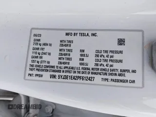 2023 Tesla Model 3 with VIN 5YJ3E1EA2PF612427, listed as a IAAI auction lot 41793756 with 17,913 mi miles and . Bid and sale history available at carsss.com. Image 9.