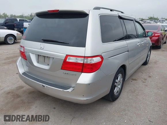 2005 Honda Odyssey EX-L with VIN 5FNRL38625B421123, listed as a IAAI auction lot 41886027 with 174,459 mi miles. Bid and sale history available at carsss.com. Image 4.