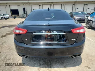 2014 Maserati Ghibli S Q4 with VIN ZAM57RTA5E1122165, listed as a Copart auction lot 60257835 with Not provided miles and Salvage title. Bid and sale history available at DreamBid. Image 6.