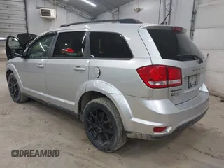 2013 Dodge Journey SXT with VIN 3C4PDCBBXDT661479, listed as a IAAI auction lot 42055731 with 151,963 mi miles. Bid and sale history available at carsss.com. Image 3.