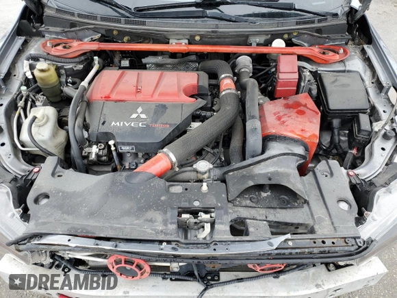2012 Mitsubishi Lancer Evolution MR z VIN JA32W5FV5CU013118, wystawiony jako Copart lot #51825555 z przebiegiem 119 651 mil mil oraz Czysty tytuł • Clean title. Historia ofert i sprzedaży dostępna na DreamBid. Obrazek 11.