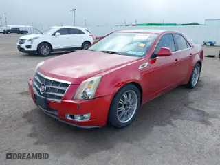 2009 Cadillac CTS RWD w/1SB with VIN 1G6DV57V490166653, listed as a IAAI auction lot 41492802 with 153,127 mi miles. Bid and sale history available at carsss.com. Image 2.