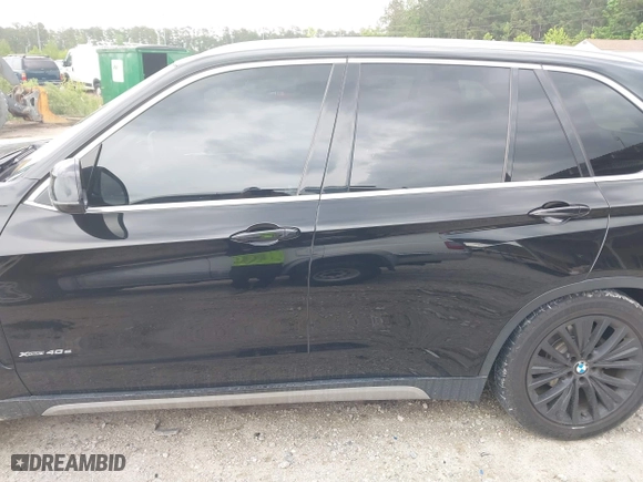 2017 BMW X5 xDrive40e iPerformance with VIN 5UXKT0C30H0V95867, listed as a IAAI auction lot 42122827 with 84,271 mi miles. Bid and sale history available at carsss.com. Image 14.
