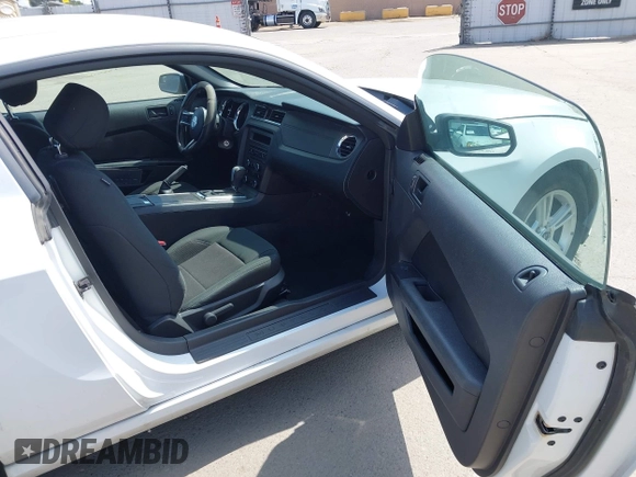 2014 Ford Mustang V6 with VIN 1ZVBP8AMXE5245688, listed as a IAAI auction lot 42074539 with 146,028 mi miles. Bid and sale history available at carsss.com. Image 5.