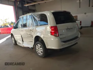 2017 Dodge Grand Caravan SE z VIN 2C4RDGBG6HR848612, wystawiony jako IAAI lot #38453498 z przebiegiem 56 964 mil mil oraz . Historia ofert i sprzedaży dostępna na DreamBid. Obrazek 3.