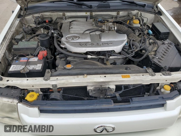 2003 Infiniti QX4 with VIN JNRDR09X83W251941, listed as a Copart auction lot 71044774 with 162,214 mi miles and Salvage Title. Bid and sale history available at DreamBid. Image 12.
