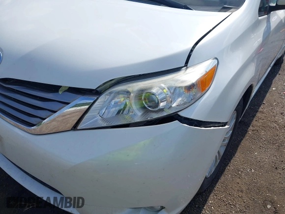 2016 Toyota Sienna XLE with VIN 5TDYK3DC4GS748888, listed as a IAAI auction lot 42605968 with 164,811 mi miles and . Bid and sale history available at DreamBid. Image 17.