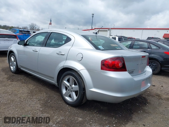 2012 Dodge Avenger SE with VIN 1C3CDZAB3CN324335, listed as a IAAI auction lot 42059158 with 202,417 mi miles. Bid and sale history available at carsss.com. Image 3.