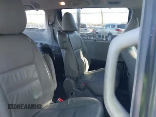 2016 Toyota Sienna XLE with VIN 5TDYK3DC3GS744752, listed as a IAAI auction lot 41077851 with 147,319 mi miles. Bid and sale history available at carsss.com. Image 8.