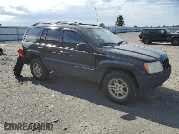 1999 Jeep Grand Cherokee Limited with VIN 1J4GW68N4XC679841, listed as a Copart auction lot 59760015 with 155,366 mi miles and Salvage title. Bid and sale history available at DreamBid. Image 4.