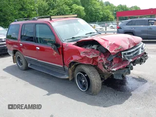 2000 Ford Explorer XLT z VIN 1FMZU73E7YZB60956, wystawiony jako IAAI lot #42218666 z przebiegiem 234 289 mil mil oraz . Historia ofert i sprzedaży dostępna na DreamBid. Obrazek 1.