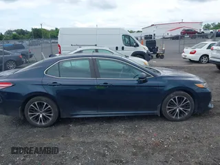 2019 Toyota Camry LE z VIN 4T1B11HK2KU738133, wystawiony jako IAAI lot #42499213 z przebiegiem 203 636 mil mil oraz . Historia ofert i sprzedaży dostępna na DreamBid. Obrazek 13.