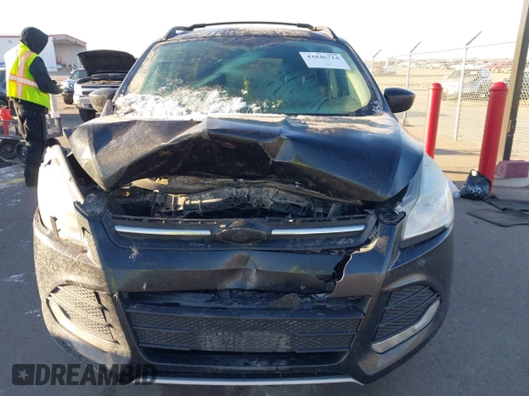 2013 Ford Escape SE with VIN 1FMCU9GX2DUC24504, listed as a IAAI auction lot 41846714 with 145,333 mi miles. Bid and sale history available at carsss.com. Image 12.