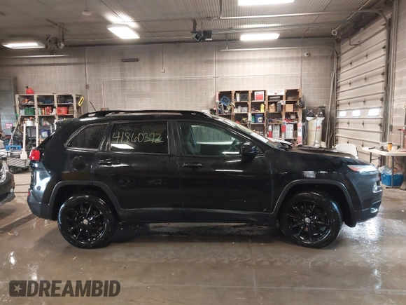 2014 Jeep Cherokee Latitude with VIN 1C4PJMCS0EW291135, listed as a IAAI auction lot 41860372 with 171,524 mi miles and . Bid and sale history available at DreamBid. Image 13.