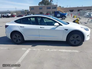 2023 Tesla Model 3 with VIN 5YJ3E1EAXPF646809, listed as a IAAI auction lot 41848687 with 32,067 mi miles. Bid and sale history available at carsss.com. Image 13.
