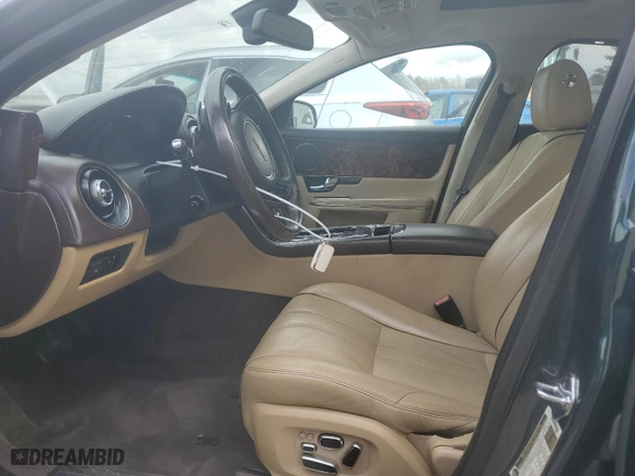 2011 Jaguar XJ with VIN SAJWA2GB2BLV01811, listed as a Copart auction lot 78380094 with 129,243 mi miles and Salvage Title. Bid and sale history available at carsss.com. Image 7.