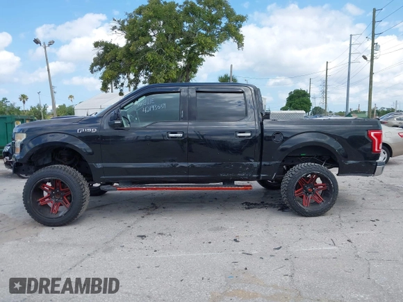 2015 Ford F-150 XLT with VIN 1FTEW1C81FFB05261, listed as a IAAI auction lot 42193554 with Not Provided miles and . Bid and sale history available at carsss.com. Image 14.