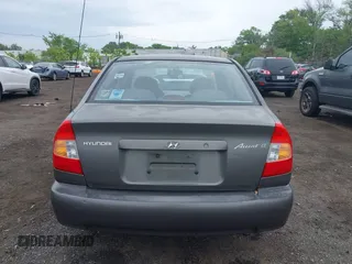 2002 Hyundai Accent GL z VIN KMHCG45C52U372587, wystawiony jako IAAI lot #42244428 z przebiegiem 43 538 mil mil oraz . Historia ofert i sprzedaży dostępna na DreamBid. Obrazek 16.