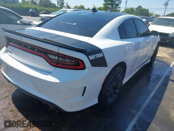 2021 Dodge Charger R/T z VIN 2C3CDXCT2MH597867, wystawiony jako IAAI lot #42212124 z przebiegiem 54 441 mil mil oraz . Historia ofert i sprzedaży dostępna na DreamBid. Obrazek 4.