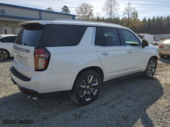 2021 Chevrolet Tahoe High Country with VIN 1GNSKTKLXMR228088, listed as a Copart auction lot 79671804 with 53,997 mi miles and Salvage Title. Bid and sale history available at carsss.com. Image 3.