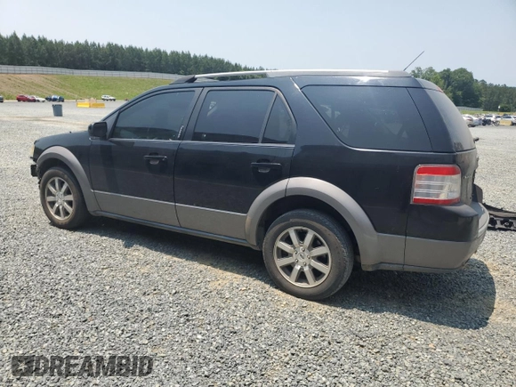 2008 Ford Taurus X SEL with VIN 1FMDK02W08GA29428, listed as a Copart auction lot 58902675 with 256,008 mi miles and Salvage title. Bid and sale history available at DreamBid. Image 2.