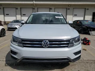 2018 Volkswagen Tiguan S с VIN 3VV1B7AX5JM062805, выставлен на аукционе Copart как лот 57927875 с пробегом 88 774 миль миль и Списание • Salvage title. История ставок и продаж доступна на DreamBid. Изображение 5.