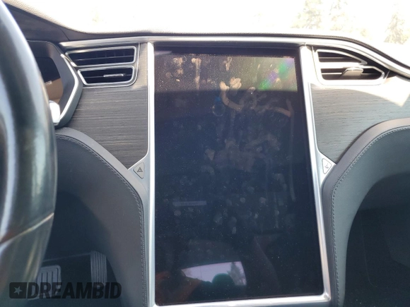 2014 Tesla Model S 60 with VIN 5YJSA1H12EFP51909, listed as a Copart auction lot 55489705 with Not Provided miles and Clean Title. Bid and sale history available at DreamBid. Image 9.