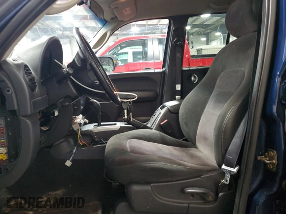 2004 Jeep Liberty Limited z VIN 1J4GL58KX4W101374, wystawiony jako Copart lot #51080895 z przebiegiem 288 747 mil mil oraz Szkoda całkowita • Salvage title. Historia ofert i sprzedaży dostępna na DreamBid. Obrazek 7.