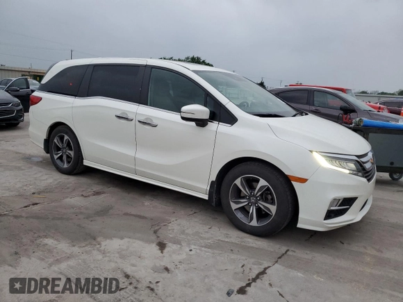 2019 Honda Odyssey Touring with VIN 5FNRL6H85KB051400, listed as a Copart auction lot 50440795 with 82,381 mi miles and Salvage Title. Bid and sale history available at carsss.com. Image 4.