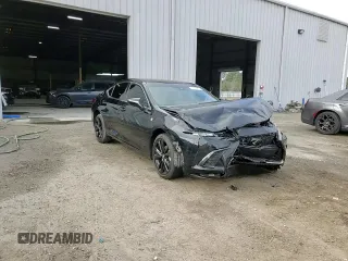 2024 Lexus ES 300h with VIN 58ABA1C15RU043954, listed as a Copart auction lot 44977915 with 9,880 mi miles and Salvage title. Bid and sale history available at DreamBid. Image 13.