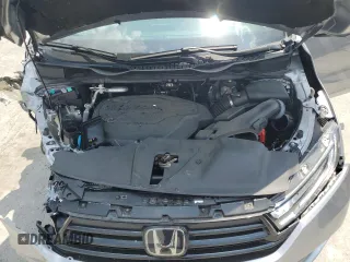 2023 Honda Odyssey Touring z VIN 5FNRL6H8XPB037385, wystawiony jako Copart lot #59461215 z przebiegiem 32 150 mil mil oraz Szkoda całkowita • Salvage title. Historia ofert i sprzedaży dostępna na DreamBid. Obrazek 12.