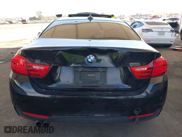 2014 BMW 4 Series 428i with VIN WBA3N7C51EK220125, listed as a IAAI auction lot 41881928 with 129,810 mi miles and . Bid and sale history available at carsss.com. Image 17.