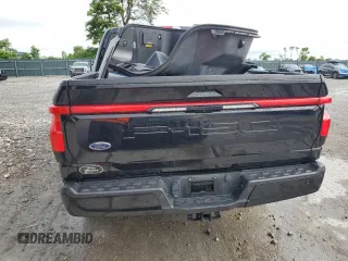2022 Ford F-150 Lightning Pro with VIN 1FTVW1EL7NWG00726, listed as a Copart auction lot 57283755 with 55,672 mi miles and Salvage title. Bid and sale history available at DreamBid. Image 6.