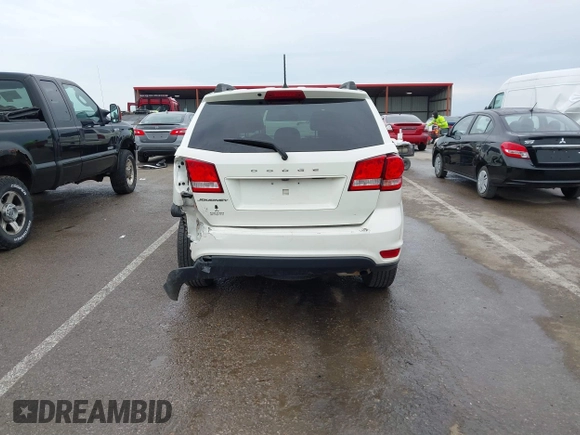 2019 Dodge Journey SE with VIN 3C4PDCBB1KT845643, listed as a IAAI auction lot 41877311 with 85,824 mi miles and . Bid and sale history available at DreamBid. Image 17.
