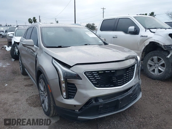 2022 Cadillac XT4 FWD Premium Luxury with VIN 1GYFZCR45NF164754, listed as a IAAI auction lot 41278705 with 65,698 mi miles. Bid and sale history available at carsss.com. Image 1.
