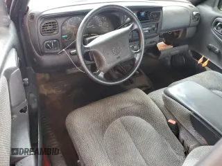 1999 Dodge Dakota SLT с VIN 1B7GG22Y8XS296134, выставлен на аукционе Copart как лот 56852575 с пробегом 238 278 миль миль и Списание • Salvage title. История ставок и продаж доступна на DreamBid. Изображение 8.