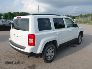 2015 Jeep Patriot Sport with VIN 1C4NJRBB0FD279697, listed as a IAAI auction lot 42523925 with 103,192 mi miles and . Bid and sale history available at DreamBid. Image 4.