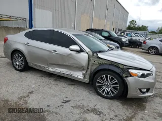 2014 Kia Cadenza Premium with VIN KNALN4D79E5126958, listed as a Copart auction lot 73138304 with 49,163 mi miles and Salvage Title. Bid and sale history available at carsss.com. Image 4.