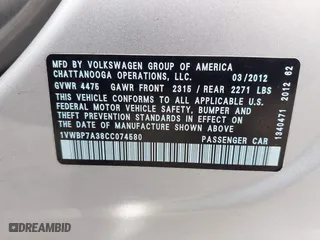 2012 Volkswagen Passat SE with VIN 1VWBP7A38CC074580, listed as a IAAI auction lot 40556967 with 158,525 mi miles. Bid and sale history available at carsss.com. Image 9.