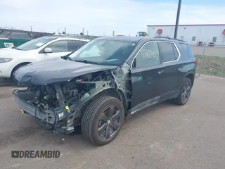 2020 Chevrolet Traverse LT with VIN 1GNEVHKW1LJ215299, listed as a IAAI auction lot 42160462 with 123,297 mi miles and . Bid and sale history available at DreamBid. Image 2.