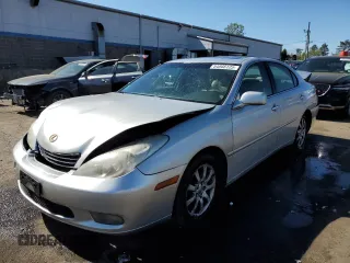 2002 Lexus ES 300 with VIN JTHBF30G720050790, listed as a Copart auction lot 54866125 with 233,167 mi miles and Salvage title. Bid and sale history available at DreamBid. Image 1.